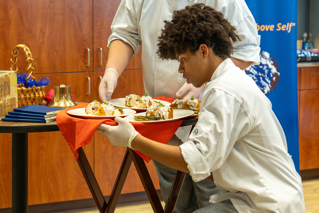 Waynesville Career Center culinary arts students serving the Waynesville-St. Robert Chamber of Commerce on Dec. 10, 2025.