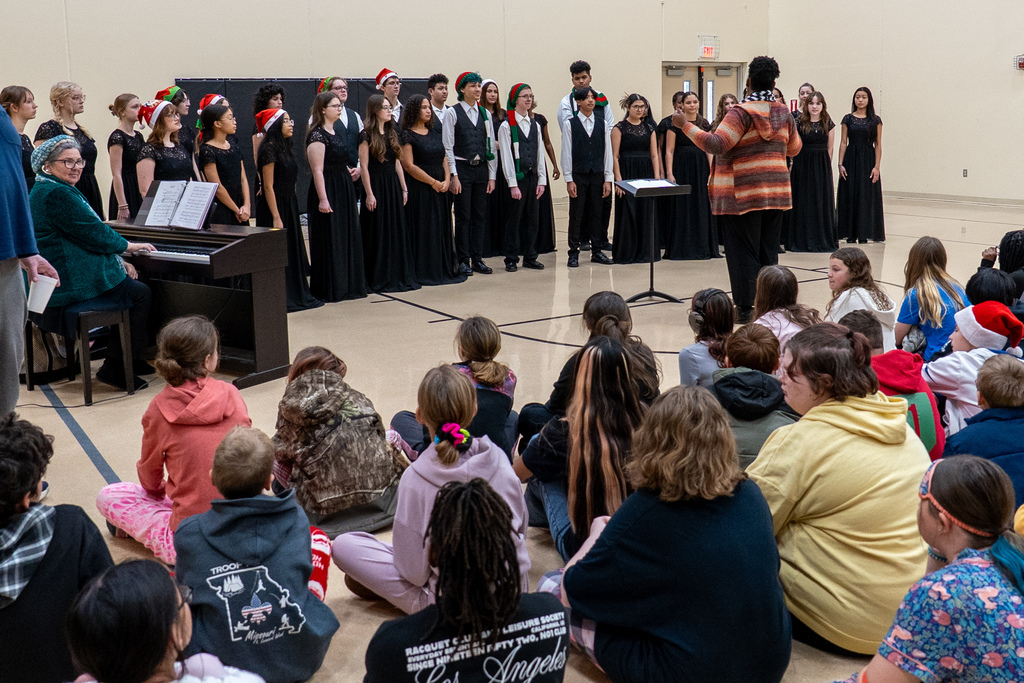 The Waynesville High School Chamber Choir performed holiday tunes before an audience of students at the Waynesville Sixth Grade Center on Dec. 12, 2025. 