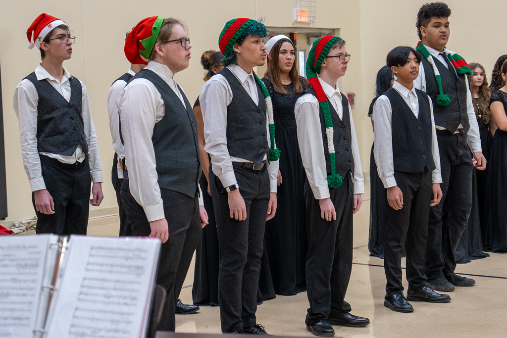 The Waynesville High School Chamber Choir performed holiday tunes before an audience of students at the Waynesville Sixth Grade Center on Dec. 12, 2025. 