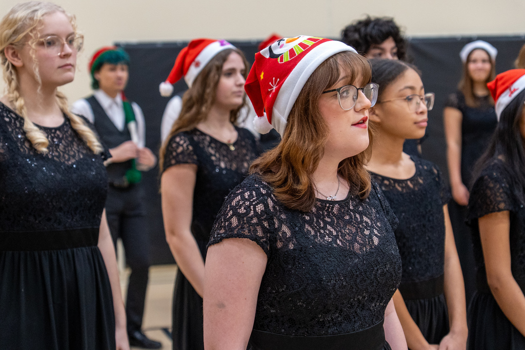 The Waynesville High School Chamber Choir performed holiday tunes before an audience of students at the Waynesville Sixth Grade Center on Dec. 12, 2025. 