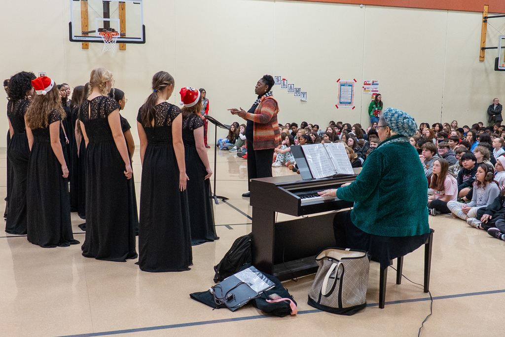The Waynesville High School Chamber Choir performed holiday tunes before an audience of students at the Waynesville Sixth Grade Center on Dec. 12, 2025. 