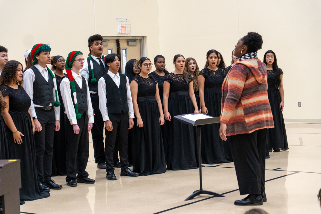 The Waynesville High School Chamber Choir performed holiday tunes before an audience of students at the Waynesville Sixth Grade Center on Dec. 12, 2025. 