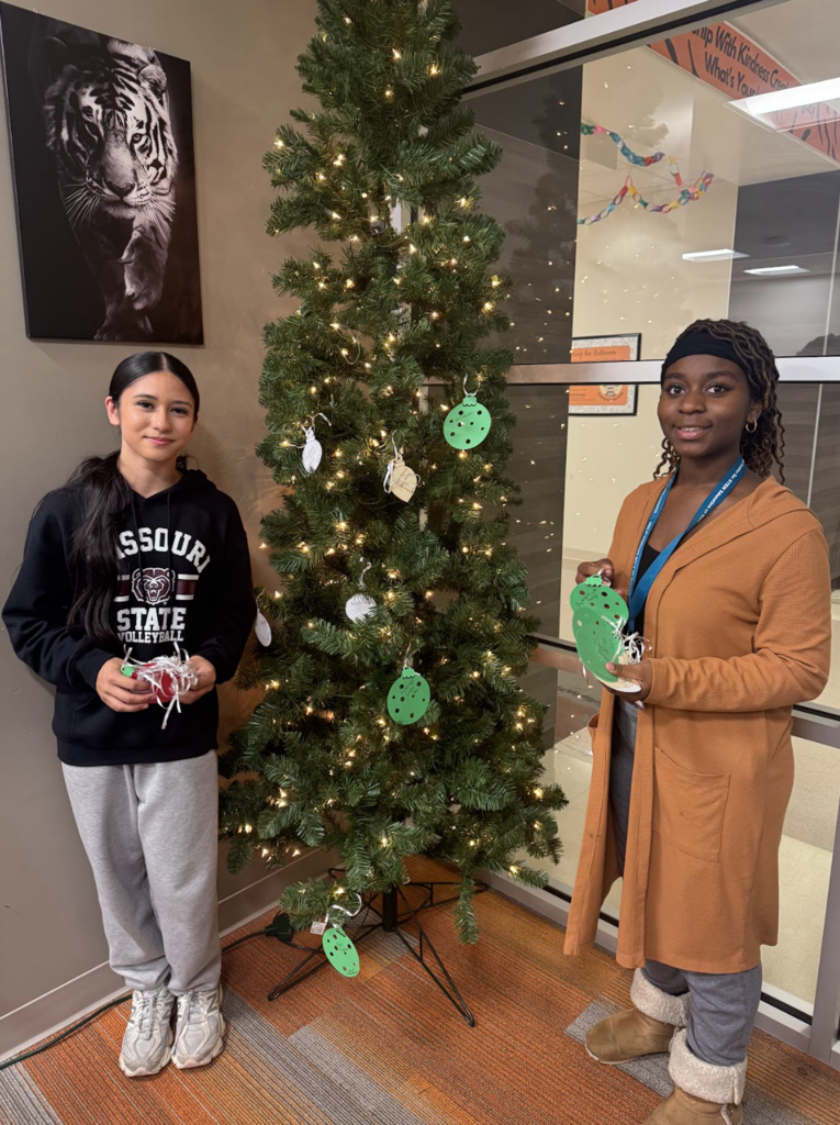 Before the holiday break, Waynesville Middle School Student Council members assisted with organizing and decorating a giving tree, fundraising for gifts, shopping for their peers and wrapping the presents. They helped make the holidays a little brighter for 17 of their peers.