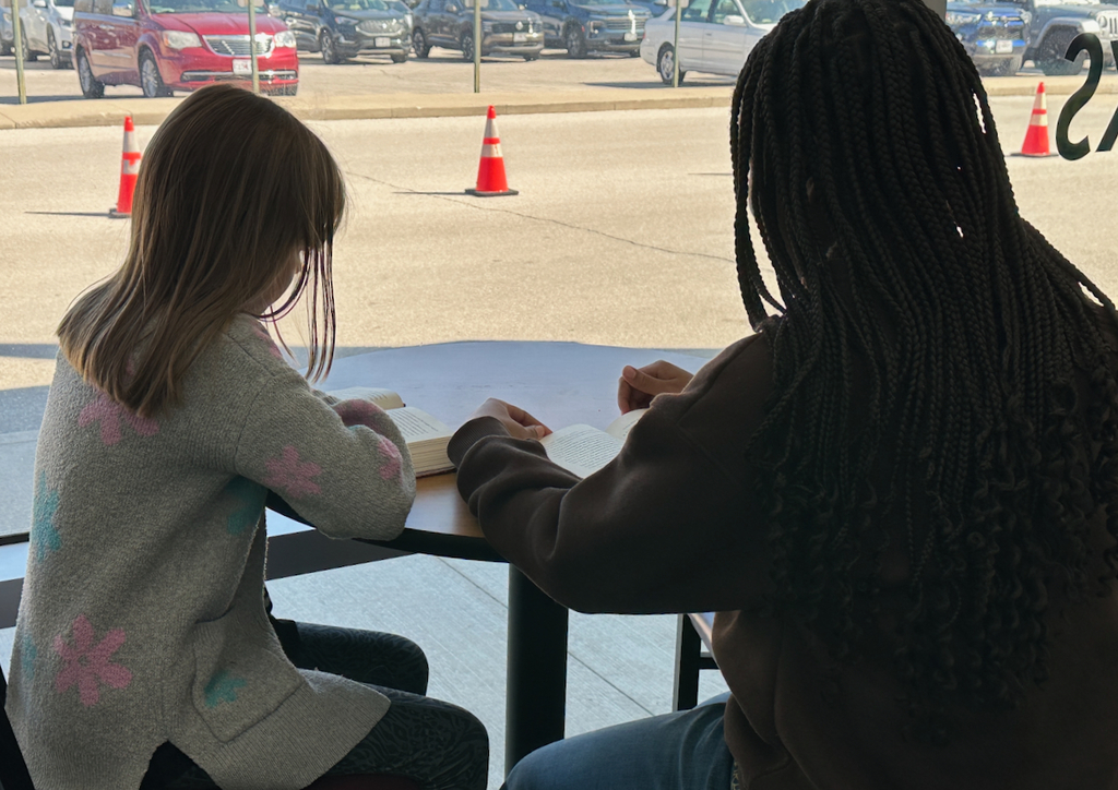 Students reading in the library 