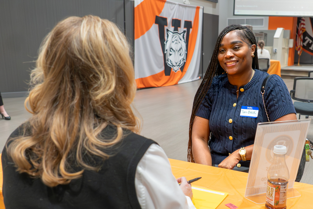 An applicant participates in screening interview