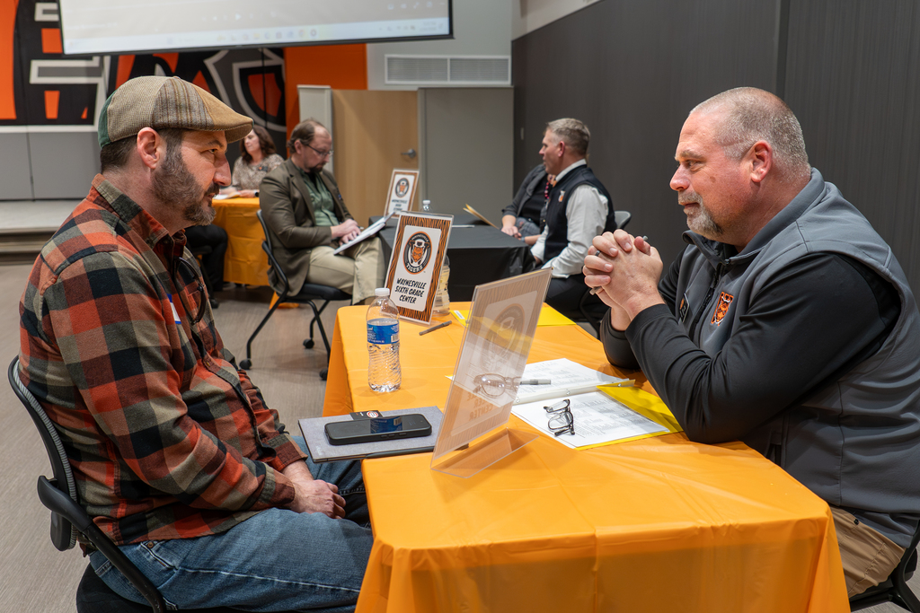 An applicant participates in screening interview