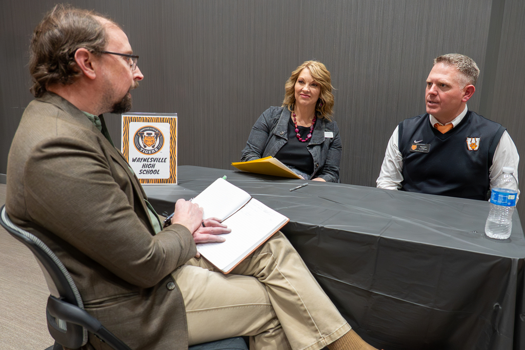 An applicant participates in screening interview