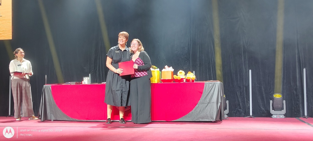 Student with certificate