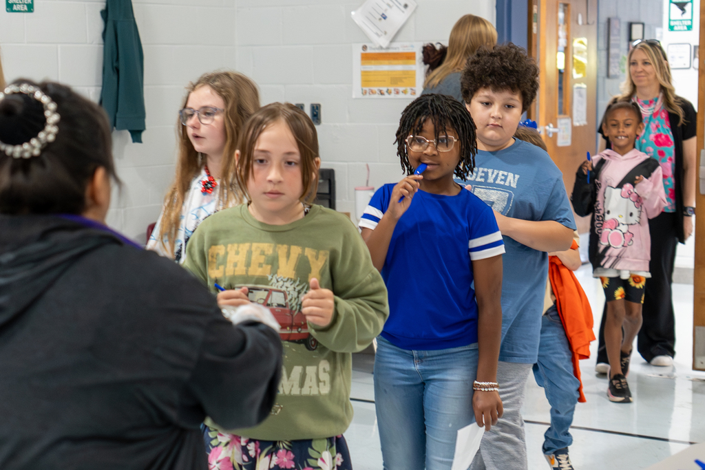 Volunteers handing out custard