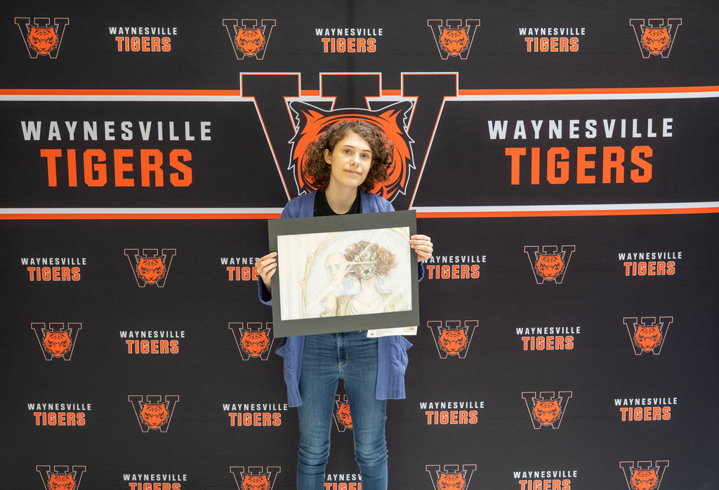 Myla Hendricks, a junior at Waynesville High School, earned a top award for her artwork at the state Capitol and received a $100 gift certificate in celebration of Youth Art Month in April 2026.   For Youth Art Month from March 9 to April 9, students from across the state are selected to have their artwork displayed in the 3rd-floor Rotunda of the State Capitol in Jefferson City, Mo. Hendricks was one of the four selected from Waynesville High School. At the closing ceremony of the Youth Art Month, 15 students were selected for the top awards. Hendricks received the Fine Arts Coordinator Choice Award for her alternate self-portrait in colored pencil titled "Masking."  She received a $100 gift certificate sponsored by Blick Art Materials. Hendricks’ teacher is Sarah Luttrell. 