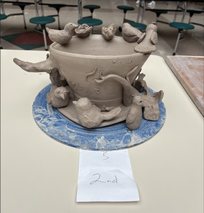 Waynesville High School art students earned seven awards at the Clay It Up/Sketch It Out Competition hosted by Nixa High School on April 18, 2026.  A total of 22 WHS students competed against peers from seven schools, taking on a series of timed challenges throughout the day. Each challenge was 70 minutes long.