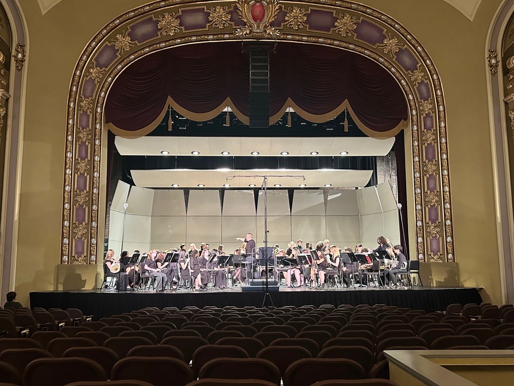 The Waynesville High School Wind Ensemble was honored to be invited to share the stage with the University of Missouri Symphonic Band on Sunday, April 26, 2026. The joint performance took place at the historic Missouri Theatre in Columbia, Mo., offering students a memorable opportunity to perform in one of the state’s premier venues.  "The students sounded great and represented Waynesville to the highest standard," said Director of Bands Jared Sabatasso.   Sabatasso was invited to guest conduct the University of Missouri Symphonic Band on one of their selections.   Pictured are members of the WHS Wind Ensemble alongside Sabatasso, as well as Dr. Amy Knopps, director of the University of Missouri Symphonic Band, and Connor Long, a Waynesville High School alumnus who now performs with the university symphonic band.