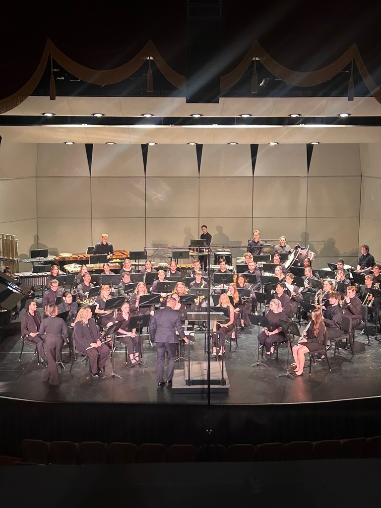 The Waynesville High School Wind Ensemble was honored to be invited to share the stage with the University of Missouri Symphonic Band on Sunday, April 26, 2026. The joint performance took place at the historic Missouri Theatre in Columbia, Mo., offering students a memorable opportunity to perform in one of the state’s premier venues.  "The students sounded great and represented Waynesville to the highest standard," said Director of Bands Jared Sabatasso.   Sabatasso was invited to guest conduct the University of Missouri Symphonic Band on one of their selections.   Pictured are members of the WHS Wind Ensemble alongside Sabatasso, as well as Dr. Amy Knopps, director of the University of Missouri Symphonic Band, and Connor Long, a Waynesville High School alumnus who now performs with the university symphonic band.