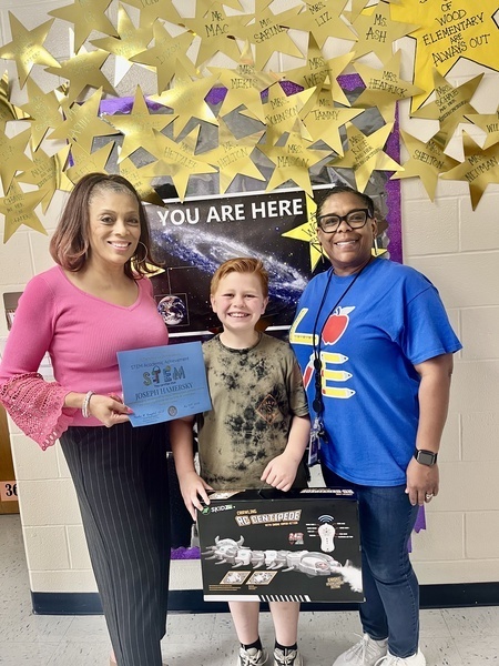 Ten Waynesville R-VI Science, Technology, Engineering and Math (STEM) Launch Teams participated in the 2026 Missouri S&T Project Lead the Way (PLTW) Showcase.     STEM Launch Academy students in grades 3-5 explored how real-world drones can make a meaningful impact by supporting people, animals and conservation efforts. Through research and collaboration, they developed ideas for using drones to deliver food and medical supplies while also monitoring the needs and behaviors of threatened and endangered animals.     Based on feedback and evaluation scores from higher-education faculty and guests at the showcase, Launch Team 5 members Hannah R., Joseph H., Gwyneth E. and Carileigh T. were selected as the Project Based Learning STEM Team of the Year.    “Their project stood out for its originality, creativity and problem-solving, featuring a skywalk that allows visitors to observe animals in a natural setting without disturbing the animals or their habitat,” said Dr. Saralice Campbell, PLTW Launch teacher.  Team 5 members received certificates, programmable robots and other prizes. 