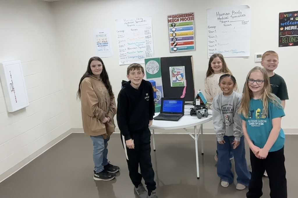 Ten Waynesville R-VI Science, Technology, Engineering and Math (STEM) Launch Teams participated in the 2026 Missouri S&T Project Lead the Way (PLTW) Showcase.     STEM Launch Academy students in grades 3-5 explored how real-world drones can make a meaningful impact by supporting people, animals and conservation efforts. Through research and collaboration, they developed ideas for using drones to deliver food and medical supplies while also monitoring the needs and behaviors of threatened and endangered animals.     Based on feedback and evaluation scores from higher-education faculty and guests at the showcase, Launch Team 5 members Hannah R., Joseph H., Gwyneth E. and Carileigh T. were selected as the Project Based Learning STEM Team of the Year.    “Their project stood out for its originality, creativity and problem-solving, featuring a skywalk that allows visitors to observe animals in a natural setting without disturbing the animals or their habitat,” said Dr. Saralice Campbell, PLTW Launch teacher.  Team 5 members received certificates, programmable robots and other prizes. 