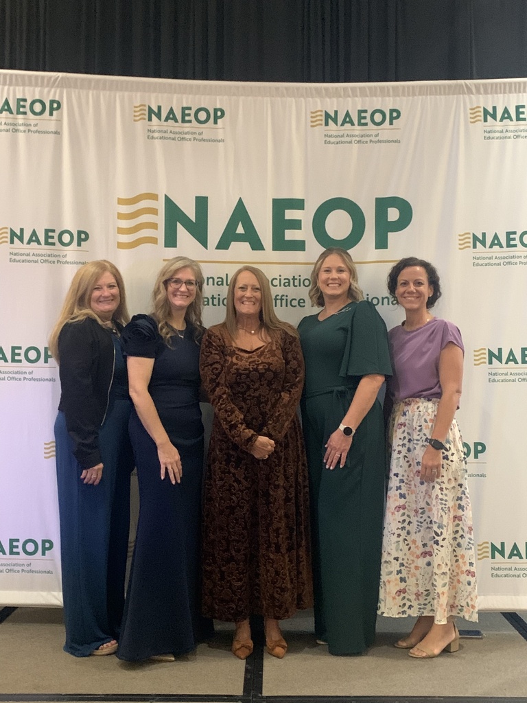 5 women posing for a photo