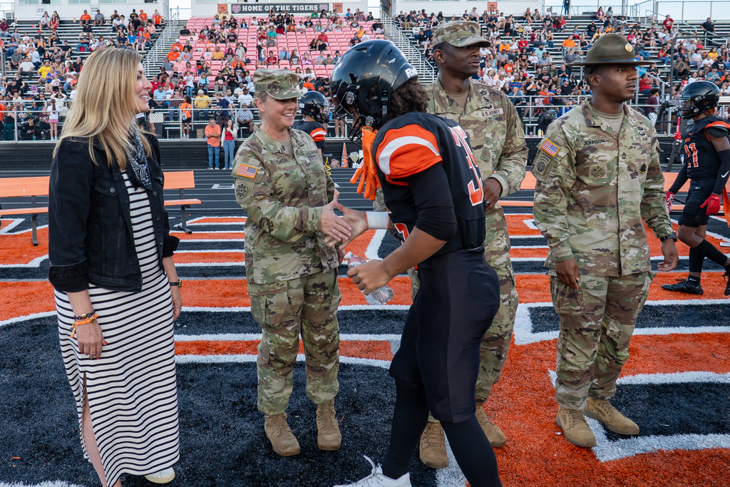 WHS players shaking hands with the Soldiers.