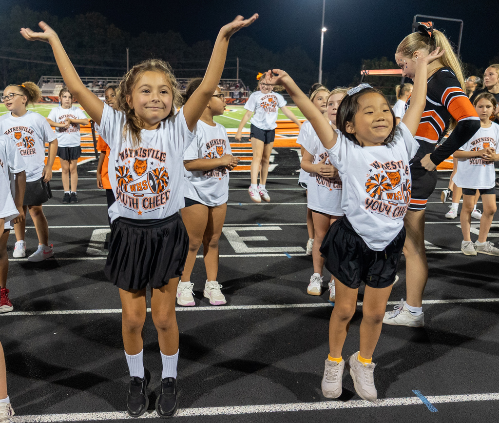 Future cheerleaders participating in a cheer