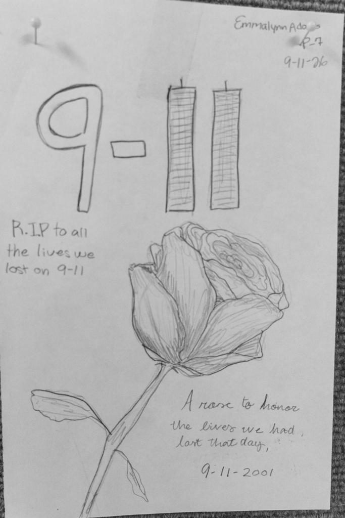 A pencil drawing with a rose that is a tribute to the lives lost on 9-11