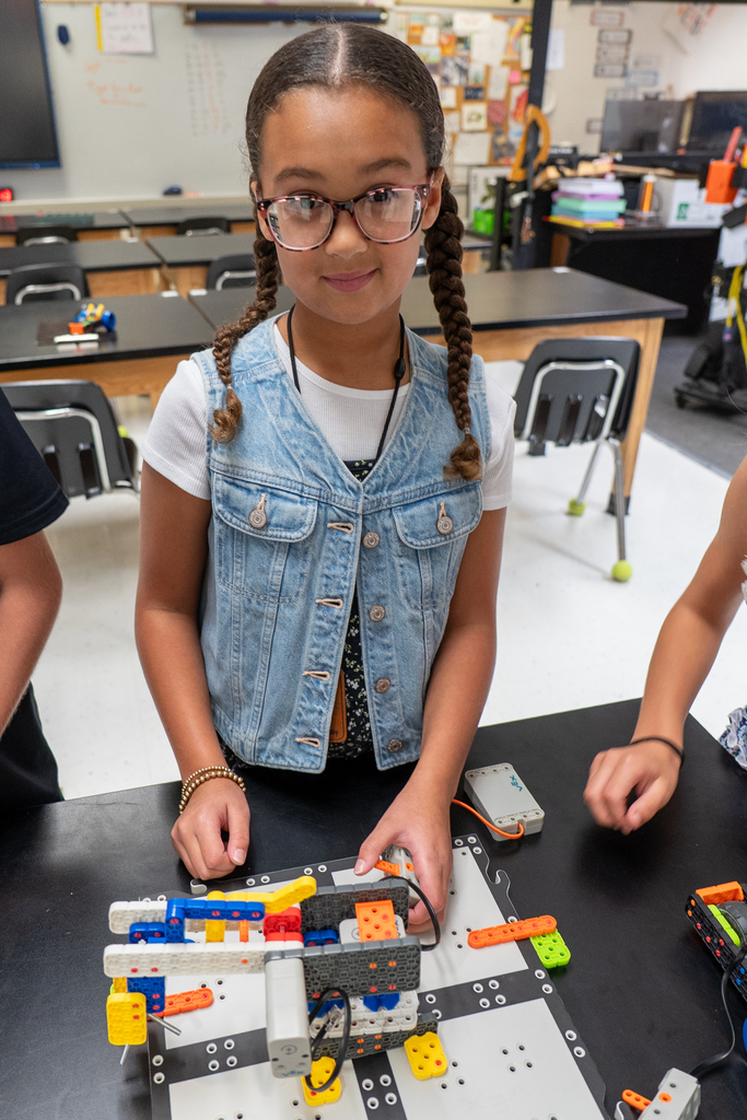 Student demonstrating robotics