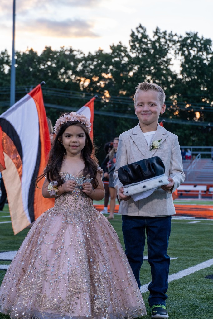 Two little kids dressed up for the crown bearers