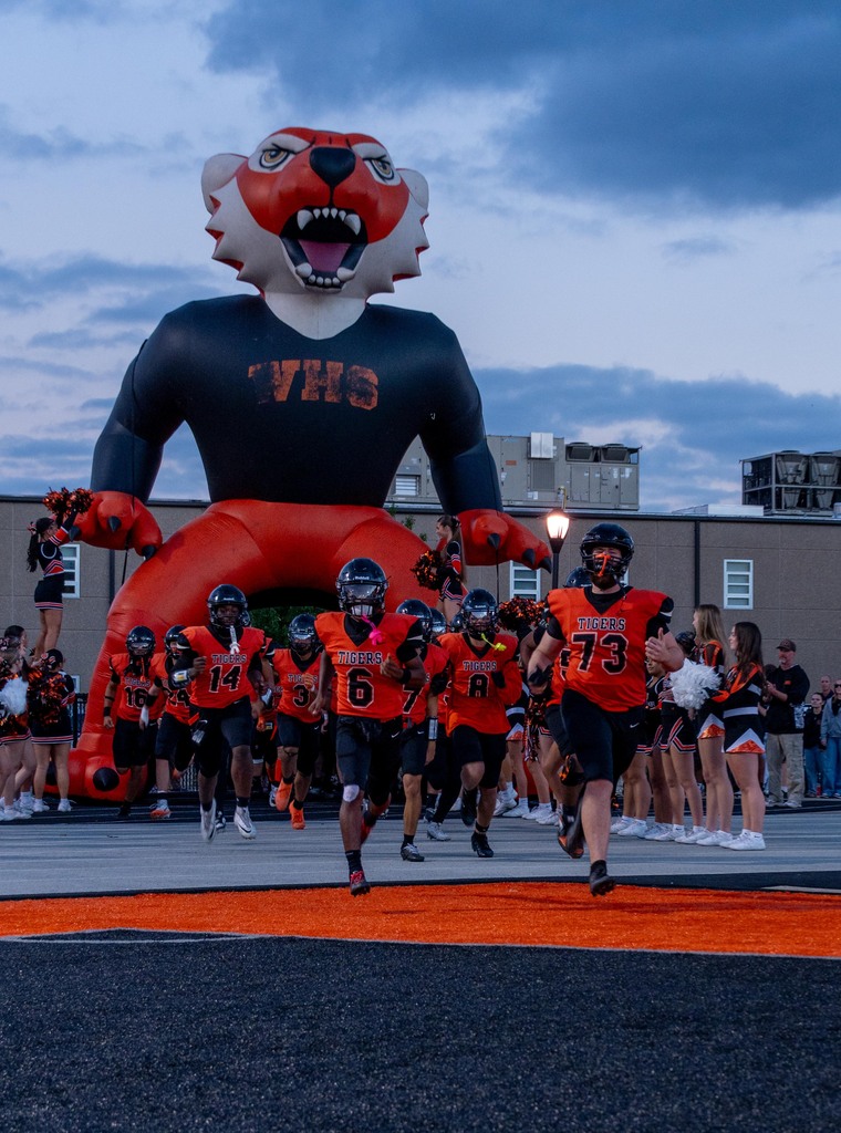 Waynesville varity football team running out to play their homecoming game.
