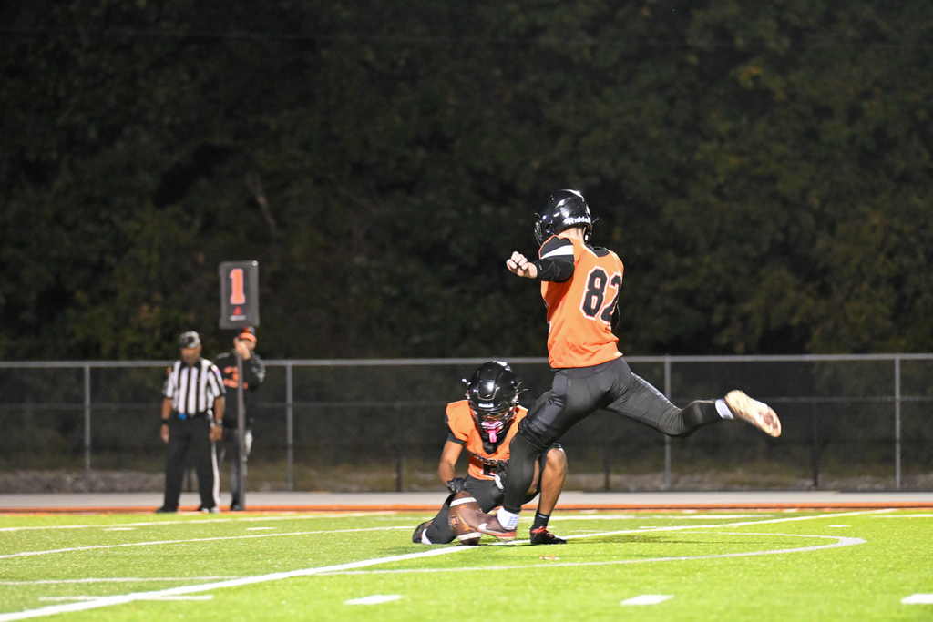 Waynesville High school Vasity kicker, kicking the ball.
