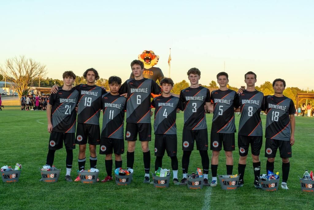 All of Waynesville's senior soccer players lined up taking a group picture.