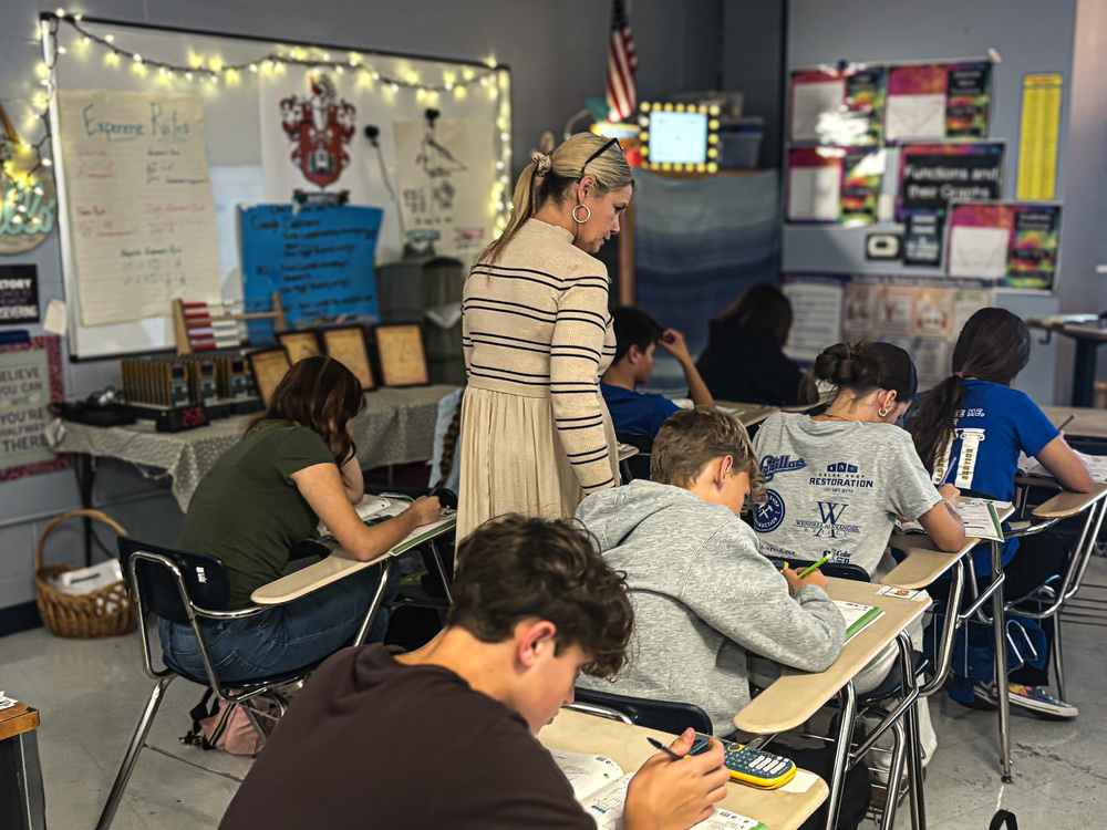 mms teacher kristy shumake working with students in math class