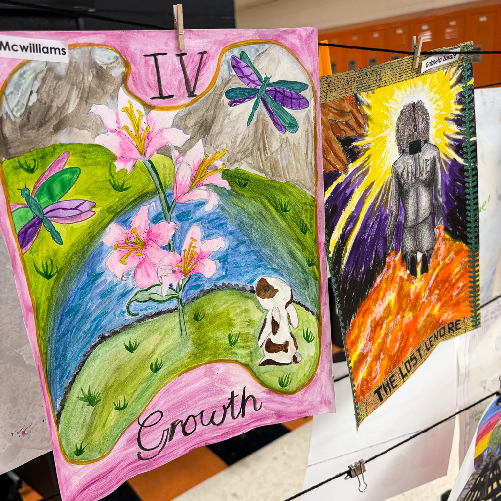 Artwork labeled IV and Growth featuring a pond, flowers, and a dog hangs with other art on a wall.