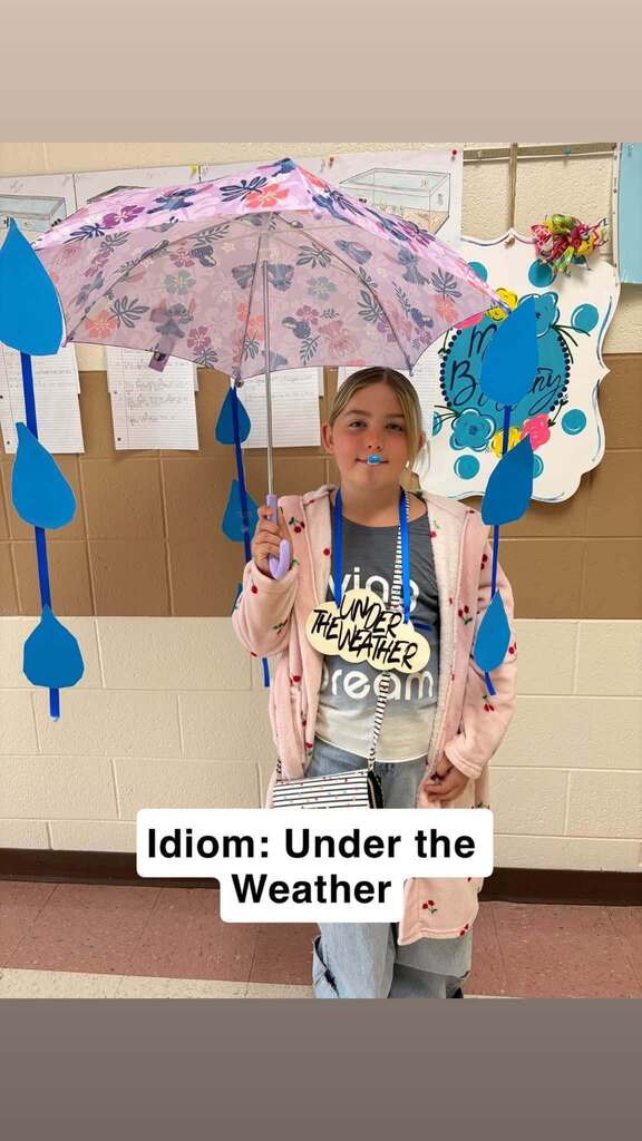 Girl with umbrella with water drops