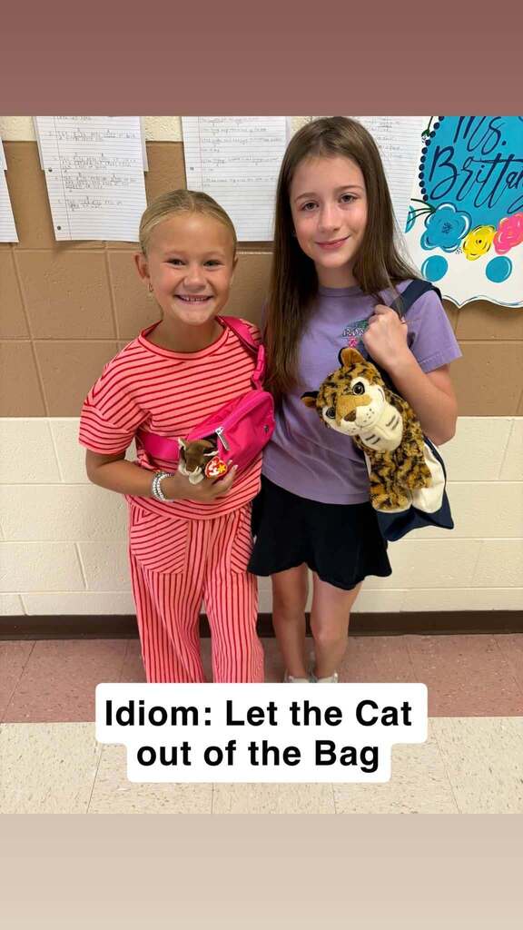 kids with cats and a bag