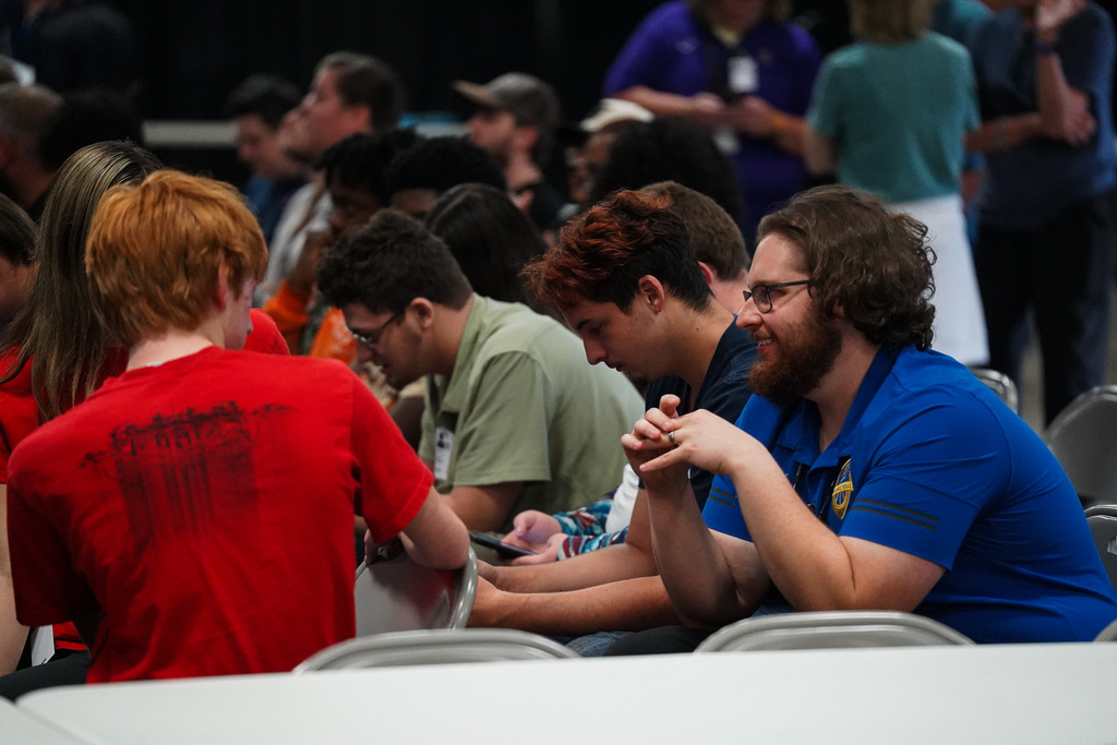 Westview students sit with their teacher among other CTE Day participants during a presentation at NASA’s Marshall Space Flight Center.
