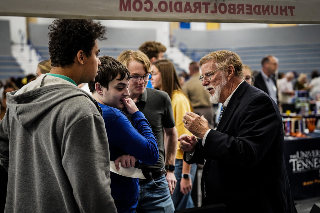An area professional speaks with high school students about broadcast radio.