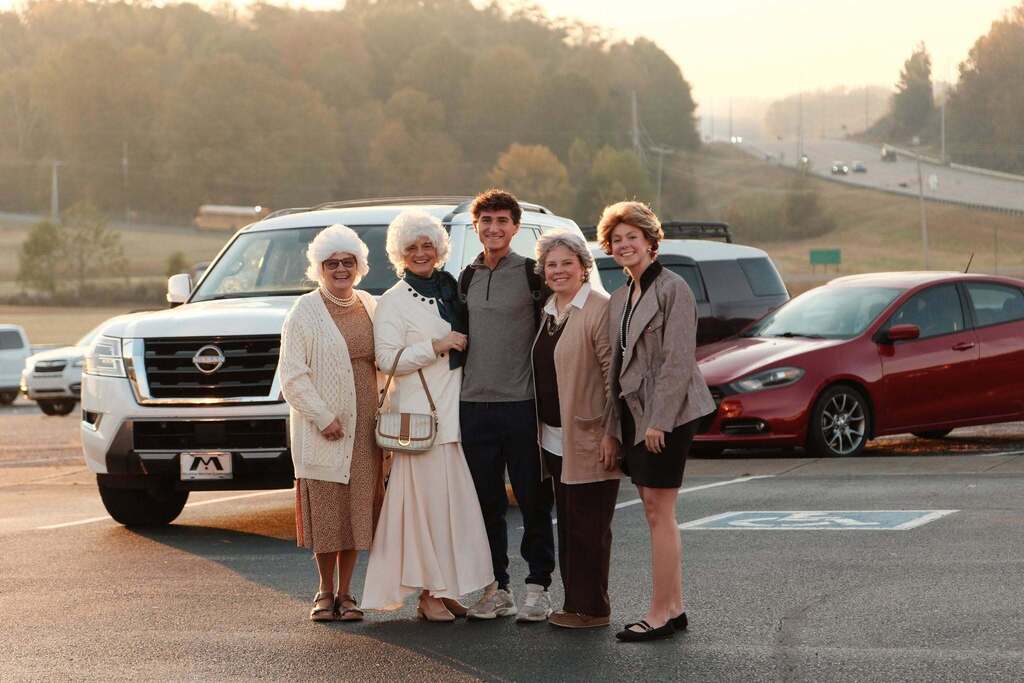 a group of teachers dress up for halloween as the cast of golden girls