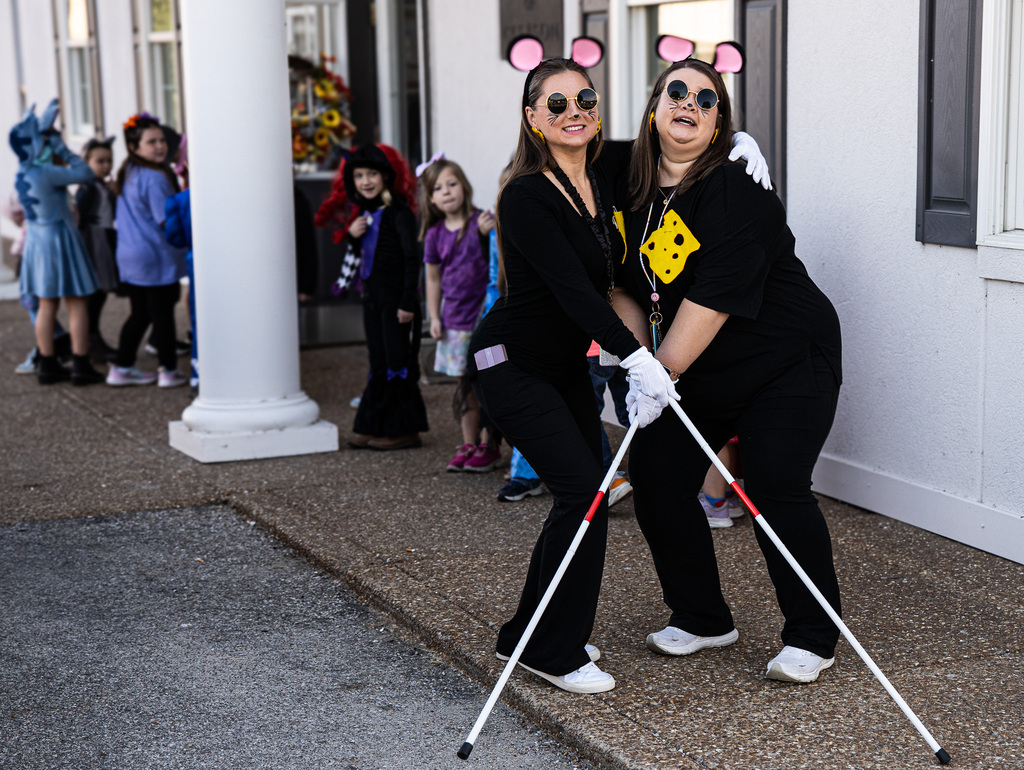 two teachers are dressed up for halloween