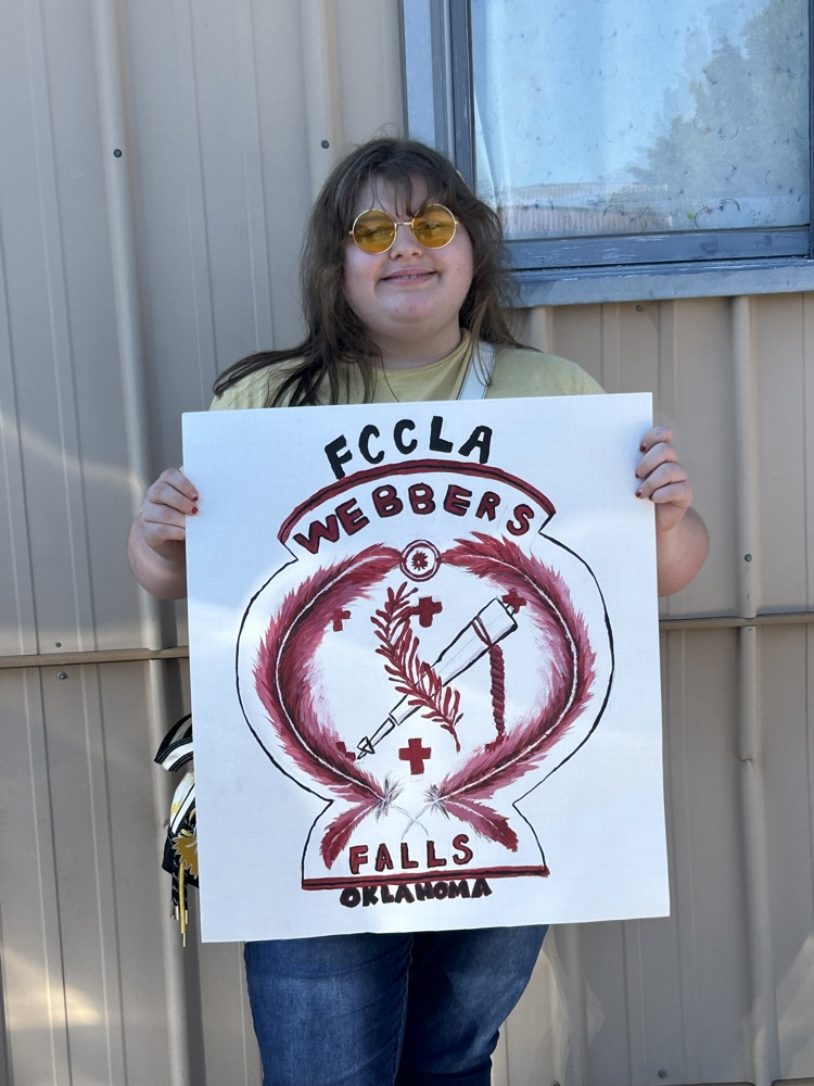 Elizabeth Watkins painted the poster for our group. We won 1st place in the poster contest!