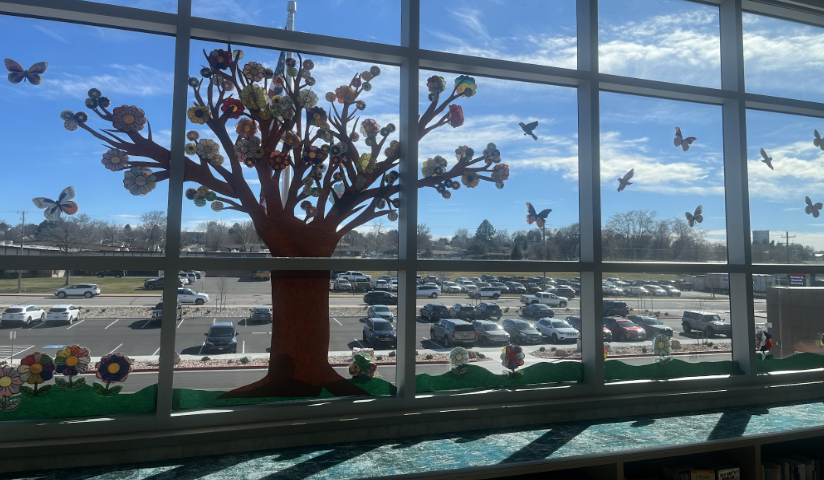image of the library window and the art the students created