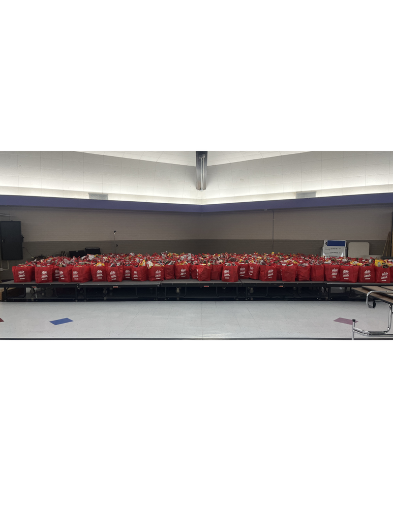 Red bags of food. Ken Garff donated to the school for every child.