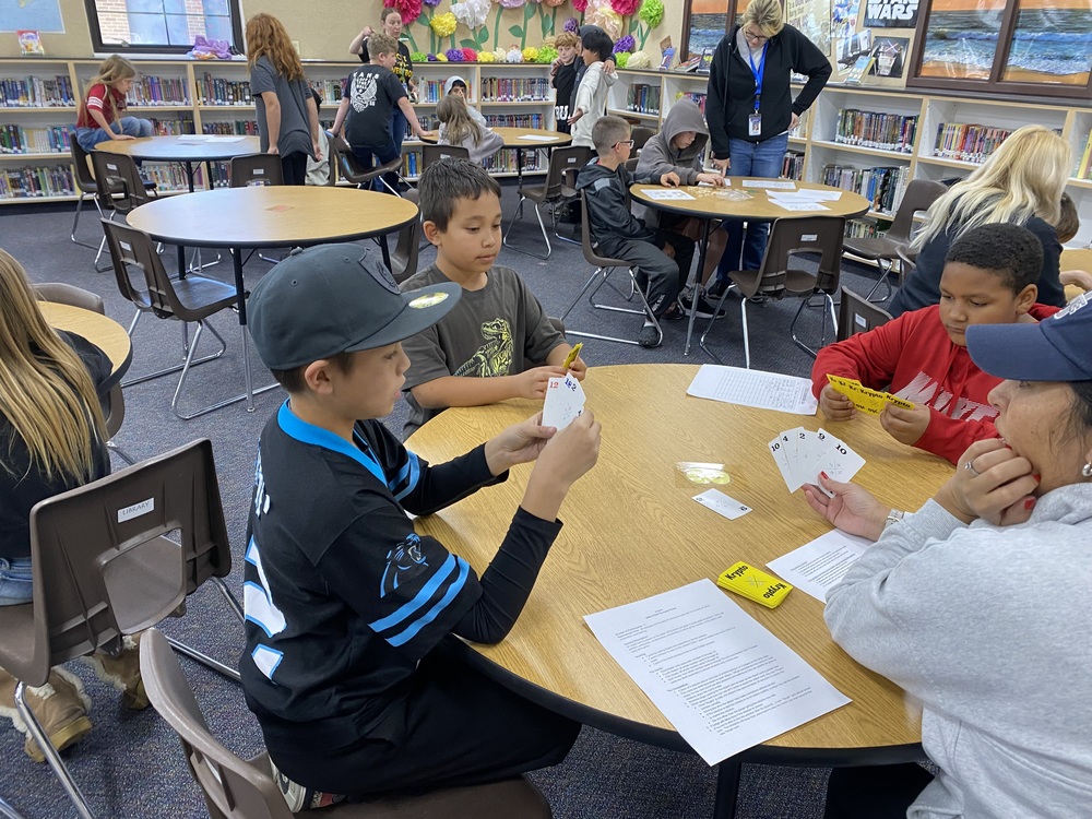 Students working on the Krypto game, practicing for the math science Olympiad
