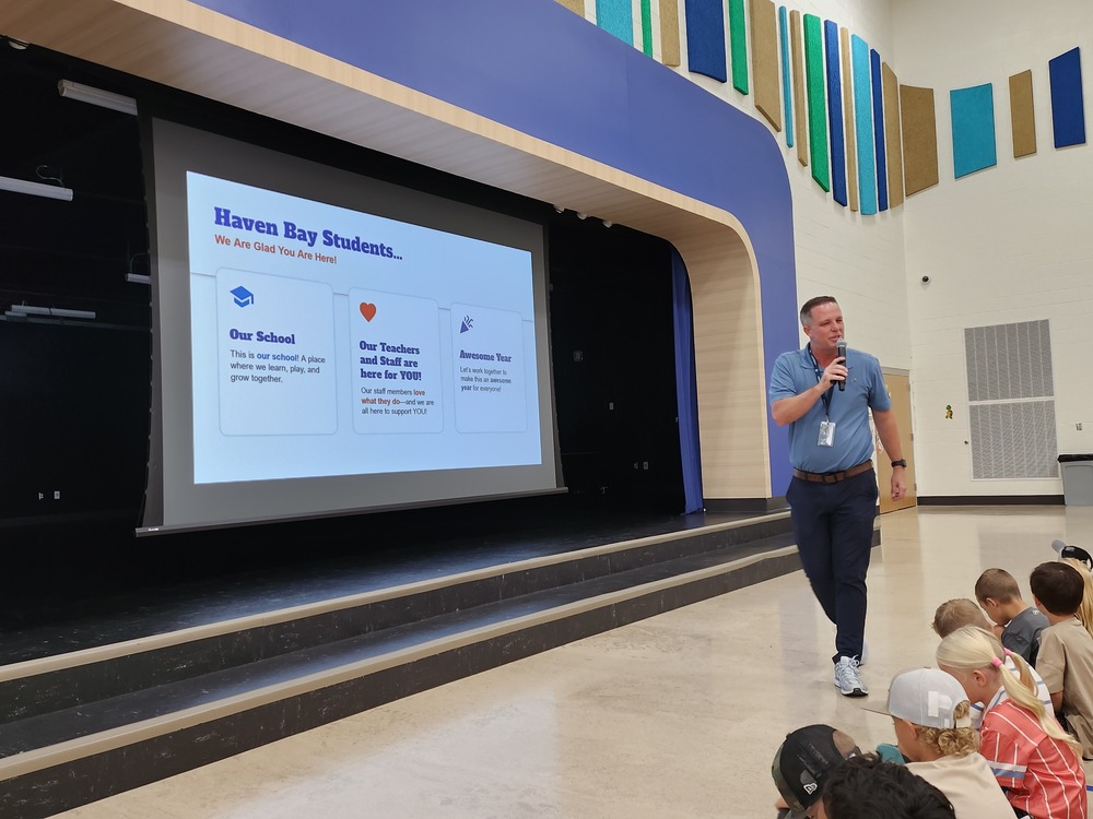 Mr. Skeen presenting school policies and expectations to students