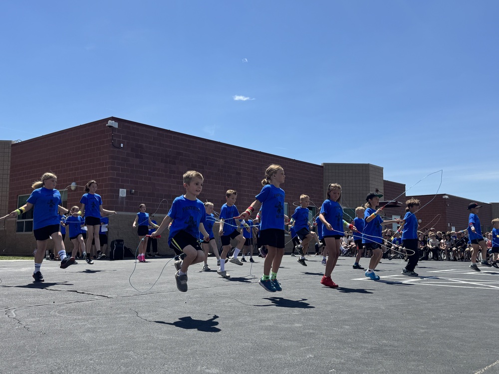 students in the jump rope club jumping