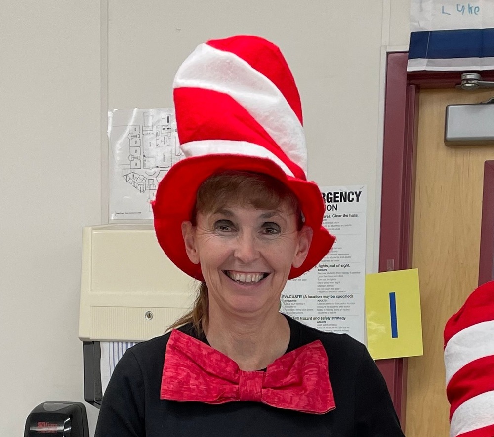 Shauna smith dressed as the cat in the hat with a student dressed up