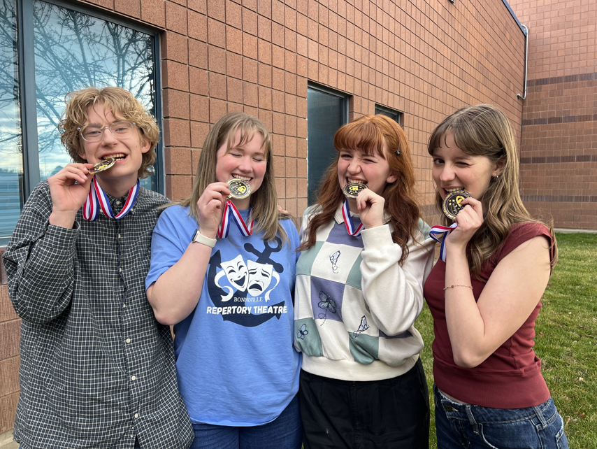 Theatre rep students pose with medals after competition
