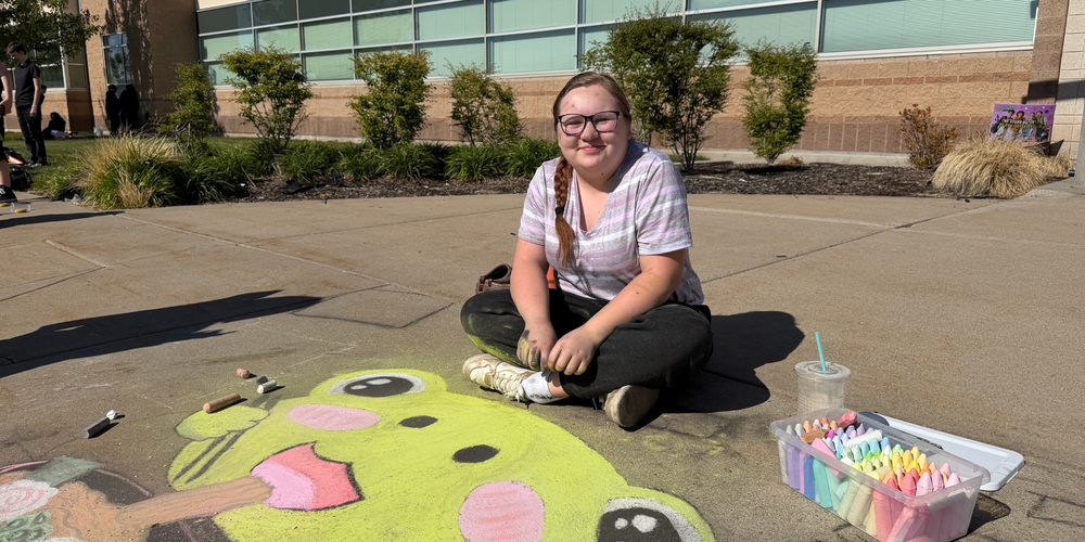 Students at the chalk art constest