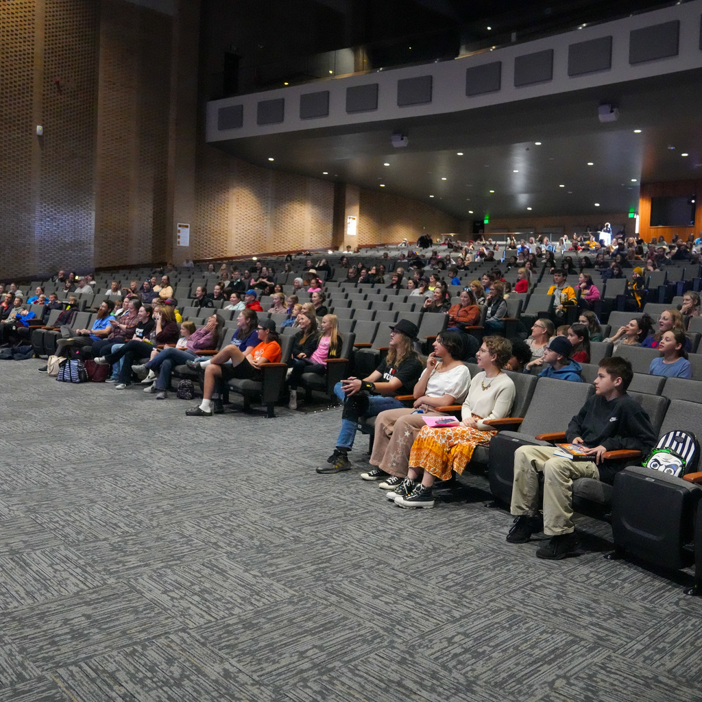 Audience listening to key note speaker.