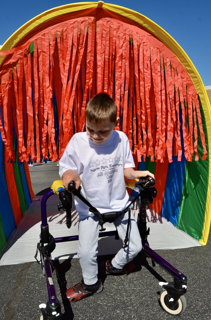 child going through tunnel at all abilities day