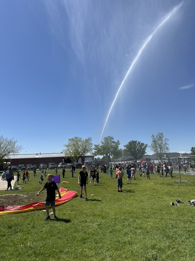 south ogden fire department spraying students with the fire truck