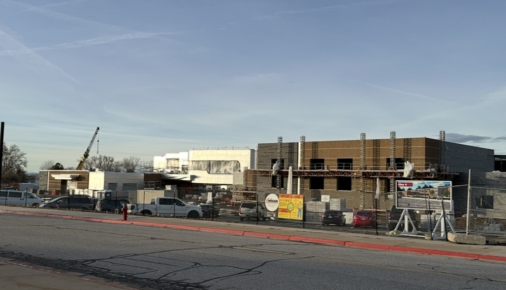 the process of the roosevelt rebuild- there is brick on the building now- scaffolding is up around the building