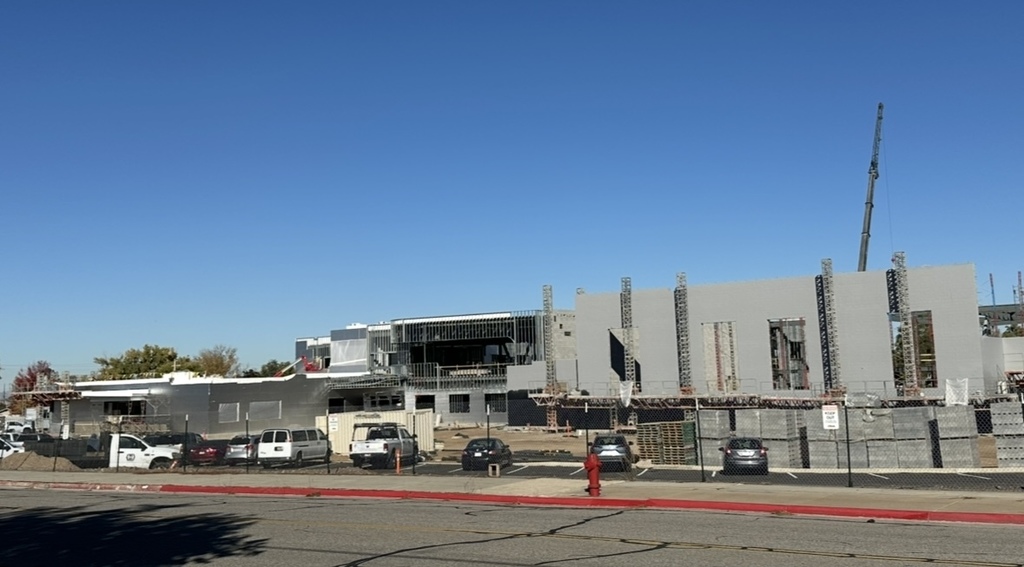 the process of the roosevelt rebuild- there is brick on the building now-scaffolding around the building